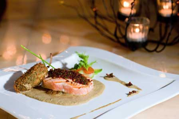 Dish of the year: Grilled salmon crusted in ancho chili with sauce of pumpkin seed and roasted tomato, by Chef José Manuel Gordián Martínez of Grand Velas Riviera Nayarit. 
